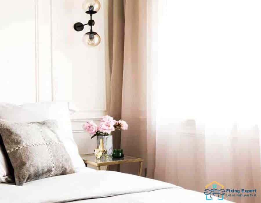 Consider sheer cream curtains! These curtains allow an adequate quantity of natural light to enter a room while maintaining an appropriate level of privacy. Plus, they're easy to care for and will add a touch of class and let you show your status and value to your guests or visitors to your bedroom.