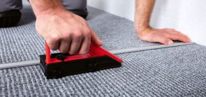 tip of binding carpet edges