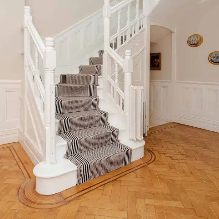 Stair carpet with rod